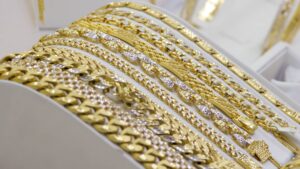 an image of 14k and 18k yellow gold jewelry on display