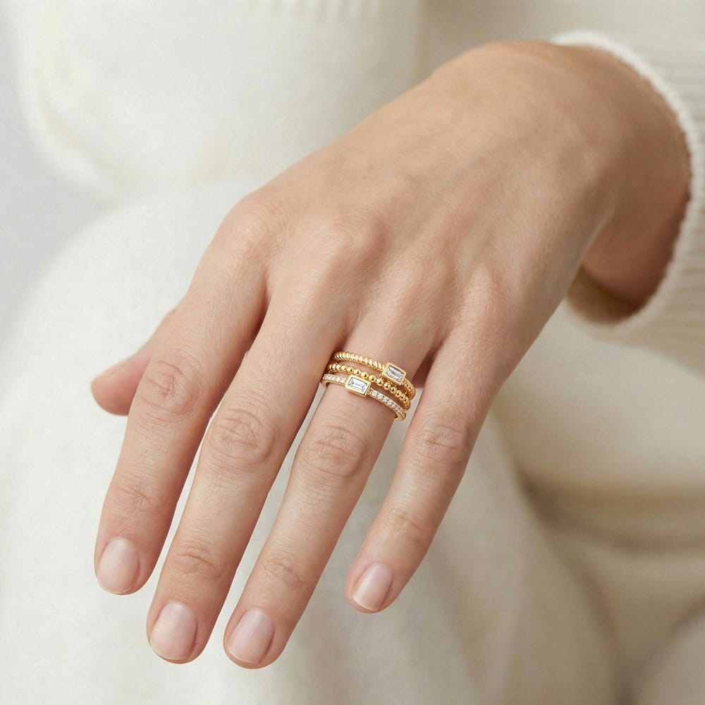 10K Yellow Gold Triple Row Baguette and Round Diamond Fashion Band - .20CTW